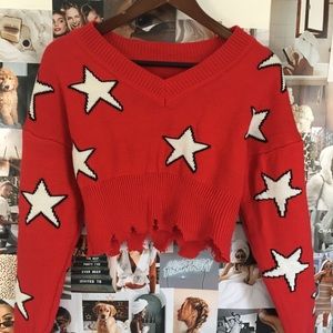 Distressed cropped star sweater